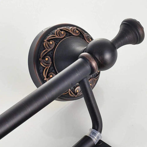 Close-up of a decorative base detail on Oil Rubbed Bronze Toilet Paper Holder With Cover, Brass Tissue Roll Holder for Bathroom.