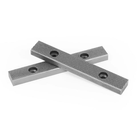 6 Inch Hardened Steel Vise Jaw Plates Pair With Mounting Screws For Bench Tools resting on a white surface, showcasing textured grip surface.