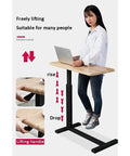 Adjustable Folding Laptop Table With Smooth Casters Total Game Changer For Couch Bed Or Office Setup Easy Roll Mobility shown raised with user.