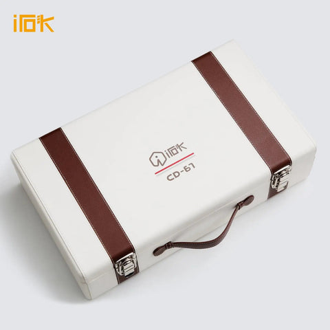 Compact 60 Percent Wired Mechanical Keyboard With Full Metal Chassis And Hot Swappable Red Switches Providing Customizable Rgb Lighting For Pc Gamers Wanting A Straight Durable Rig Upgrade That Is Totally Dialed In in a white and brown carrying case.