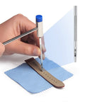 Using Watch Link Removal Kit With Leather Strap Punch And Durable Band Tool on watch strap with blue fabric base