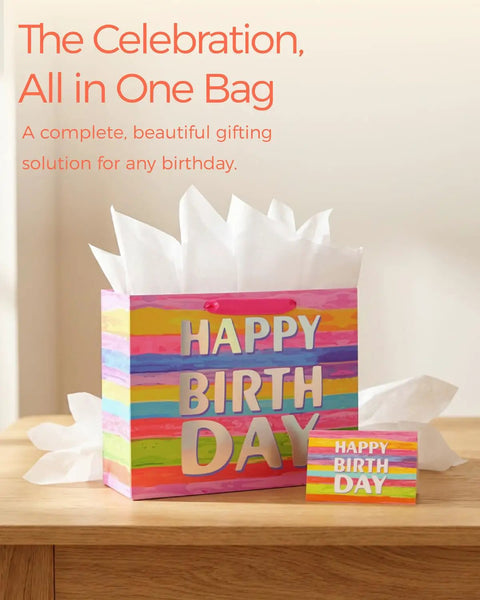 Colorful Go To Birthday Gift Bag With Tissue Paper And Card Premium Paper Tote For Kids Women And Moms Gifts on table.
