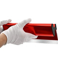 Hands holding Drywall Skimming Blade Set With Extension Handle For 12, 22, And 32 Inch Blades, red aluminum build.