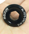 Beefy M18 Crank Arm Bolt Aluminum Alloy in black, CNC machined threads, held in a hand, cycling part for mountain bike crank cover.