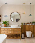 Three Color Barn Pendant Light Set In Nordic Macaron Style With Green Yellow And Smoke Gray Domes in a modern bathroom.