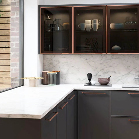 Modern kitchen with Six Pack 5.04 Inch Center To Center Antique Copper Drawer Pulls Red Bronze Bar Handles on dark cabinets.