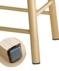 20 Pack 1 Inch Square Furniture Sliders With Self Adhesive PTFE Glide Pads on chair leg close-up