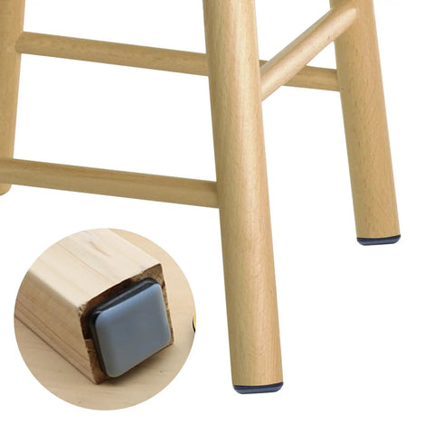 20 Pack 1 Inch Square Furniture Sliders With Self Adhesive PTFE Glide Pads on chair leg close-up