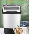Slick 14 Lb Portable Washer Dryer Combo For Dorms And Rv Fits Any Sink Spin Cycle Compact Laundry Machine in a laundry setting with clothes.