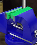 Pro Level Knockout Magnetic Vise Jaw Pads 2 Pack in blue vise with green non-marring pads for secure grip on metal and wood.