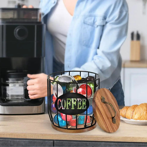 Large Capacity Coffee Filter Holder With Lid, Pod Organizer For K Cups And Filters on kitchen counter next to coffee maker.
