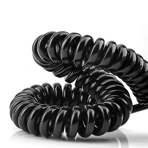 Hella Durable Spiral Spring Power Extension Cord expands up to 15 meters, black coiled design for flexible use and storage.