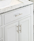 30 Pack 5 Inch Cabinet Pulls With 3 Inch Hole Centers Zinc Alloy Handles In Brushed Nickel Finish Installed on White Cabinet