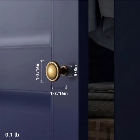 Top Shelf Antique Brass Cabinet Knobs Six Pack Round single hole knob mounted on a cabinet, measuring 1-3/16in by 5/8in, aged brass finish.