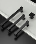 10 Pack 5-Inch Matte Black Cabinet Pulls for Cabinets and Cupboards, shown on a black and white surface, showcasing modern design and durability