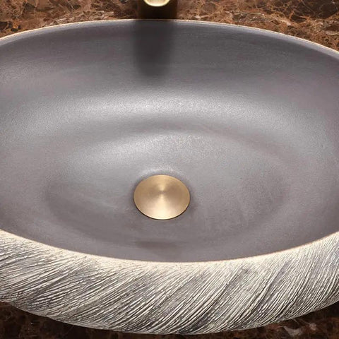 USZWBY Vessel Sinks Bathroom Vessel Sink Washbasin Ceramic Art Countertop Basin round gray bowl with bronze drain detail.