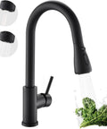 Slick Matte Black Kitchen Faucet With Pull Down Spray And Smooth Single Handle Control Built Like A Brick House With Solid 304 Stainless Steel Absolutely No Sweat Leak Proof Performance Everywhere, shown spraying water on greens.