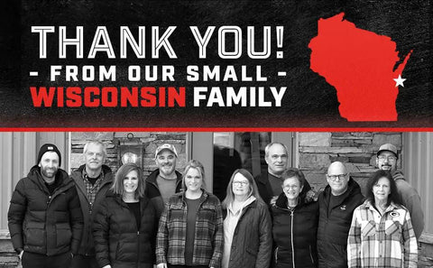 Group photo of a family in front of a building with 'Thank You from Our Small Wisconsin Family' text and Wisconsin state outline graphic.