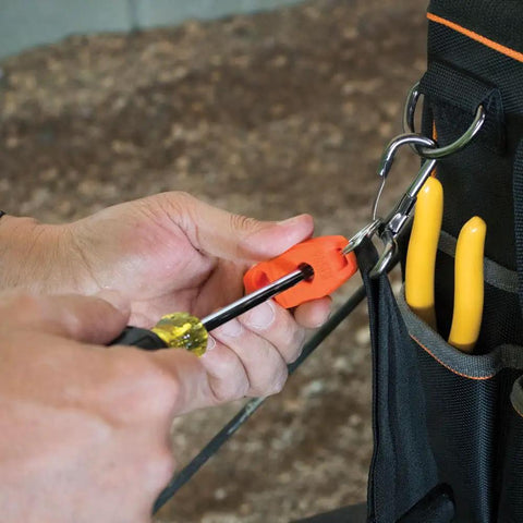 Using Magnetizer Demagnetizer Screwdriver Set, 7 Piece Kit With Magnetic Tips on tool bag outdoors.