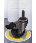 Four Piece Pack Of Heavy Duty Furniture Casters Featuring 1 Inch Silent Rubber Wheels Threaded Mounts Secure Brake Smooth Glide Daily Built Tough A Real Deal Home Upgrade close-up of a 1-inch rubber caster with threaded mount and brake on a smooth surface.