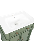 HAOCHRYSYPH Ceramic Basin, Sink Only, White, 27.83 x 18.70 x 7.00 in. top view with integrated sink on green cabinetry.