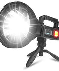 Rechargeable LED Spotlight Flashlight 2500 Lumens With Four Modes IPX5 Waterproof on tripod shining brightly