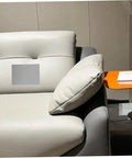 Self Adhesive Linen Repair Patch Kit, 5 Pieces, Grey Appliques installed on a grey sofa for furniture fix