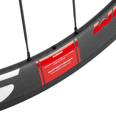 Close-up of 50mm Carbon Clincher Wheelset For Road Racing 700c with 23mm Width Toray T700 Matte 3K Finish UCI Approved White And Red Decals