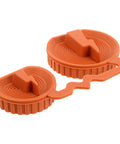 Heavy Duty Universal EV Charging Port Cover Silicone Cap Waterproof Dustproof Protective Plug With Slick Design in orange color.