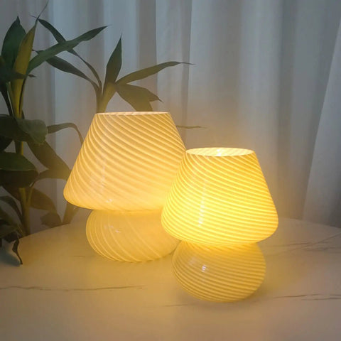 Swirl Mushroom Glass Lamp In Striped Pink, Hand Blown Translucent Murano Style Table Bedside Light on table glowing warmly