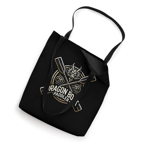 Black dope dragon boat paddler tote bag with dragon head centerpiece, crossed paddles and wave motifs laying flat