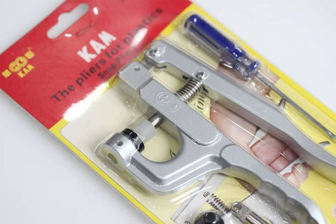 Snap Pliers Kit For No-Sew Button Snaps Handheld Press Attacher With T3 T5 T8 Dies shown in packaging, includes tools