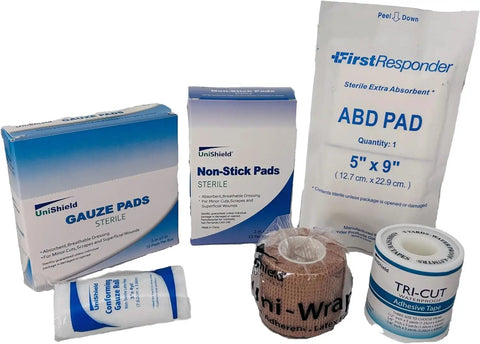 Reliable Grab And Go First Aid Refill Kit With High Quality Wound Care Essentials For Restaurant And Commercial Use Class B Compliant includes gauze, non-stick pads, ABD pad, and adhesive tape.