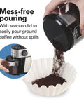 Electric Burr Coffee Grinder With Large 16 Ounce Hopper And 18 Precision Grind Settings for easy pouring into filter.