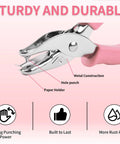 Close-up of dual hole punch set with soft grip handles in pink, showing metal construction and labeled features