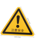 Yellow triangle caution sticker from 24 Pack Caution Stickers For Equipment And Factory Safety Signs Decals Durable Easy To Apply Warn Labels For Machinery And Work Areas In Busy Factories.