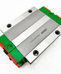 Beefy HGW20HC Linear Block Carriage For CNC Machinery With Heavy Load Capacity, Ultra Smooth High Speed Motion, High Rigidity And Precision, Flange Mounted Linear Guide Rail, Slider Bearing, And Custom Lengths, silver steel block with green end caps
