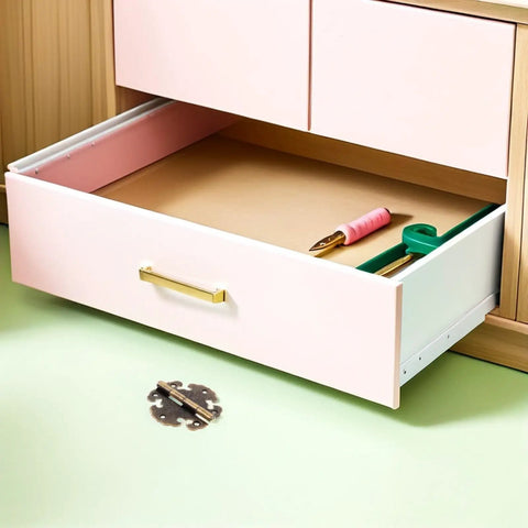Open drawer with tools, showcasing Old School Vintage Zinc Alloy Cabinet Door Hinges 2 Pack on green surface