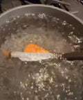 12 Pack Arrow Fletching Kit With 2 Inch Vanes Shrink Fletch Stretch Feather Wraps in boiling water setup