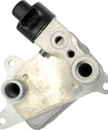 Top-Tier EV Battery Cooler Ensures Your Electric Ride Stays Ice Cold With This Direct Swap Unit showing metal EV cooling unit and connector.