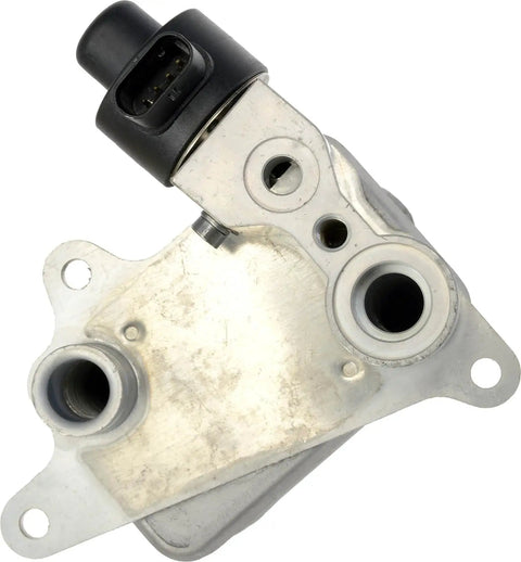 Top-Tier EV Battery Cooler Ensures Your Electric Ride Stays Ice Cold With This Direct Swap Unit showing metal EV cooling unit and connector.