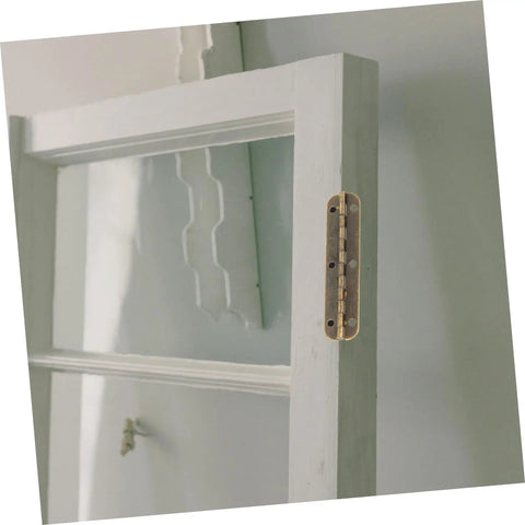Tank Tough Heavy Duty Piano Hinges For Cabinets And Toolboxes 150 By 10 Mm Antique Brass continuous butt hinge installed on a cabinet.