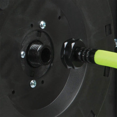 Close-up of Levelwind Retractable Air Hose Reel 3/8 Inch By 75 Feet connection point with ZillaGreen hose in garages and shops.