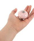Person holding a blush ceramic drawer handle from 4 Pack Handcrafted Blush Ceramic Drawer Handles For Dresser And Kitchen Cabinets Single Hole Vintage Cabinet Knobs For Wardrobe And Furniture Pulls Rustic Style Easy Grip Pulls For Cabinets