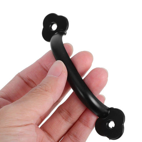 Hand holding Vintage Metal Drawer Pulls Three Piece Set, Rustic Black Alloy Cabinet Handles with smooth grip