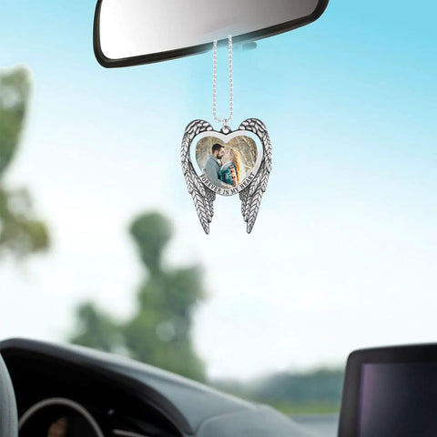 Sublimation Angel Wing Ornament Blanks Set With Metal Love Heart Pendant hanging from rearview mirror in car, silver.