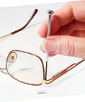 Person repairing eyeglass hinge using 200 Piece Eyeglass Gaskets And Washers Set For Metal Rimless Frames Quick Spectacle Repairs
