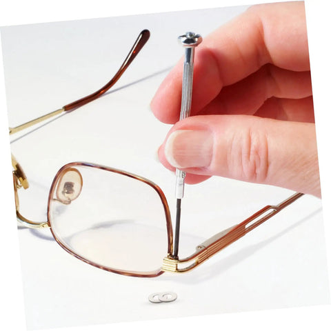 Person repairing eyeglass hinge using 200 Piece Eyeglass Gaskets And Washers Set For Metal Rimless Frames Quick Spectacle Repairs