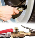 Person using Straight Up Slick Lock On Tire Inflator Chuck Quick Release Valve on a tire, showcasing a durable metal design.