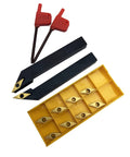 Two black 1/2-inch indexable turning tool holders with VCMT carbide inserts and a yellow insert storage case